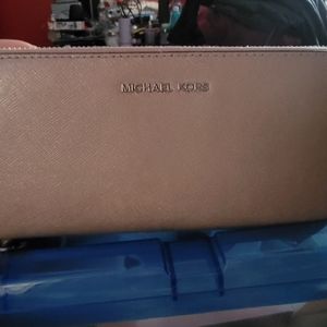 Michael Kors' wristlet rose